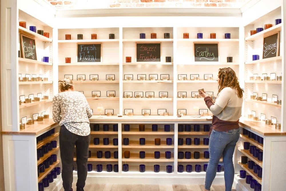 Cork & Candles fragrance wall with 60+ scents
